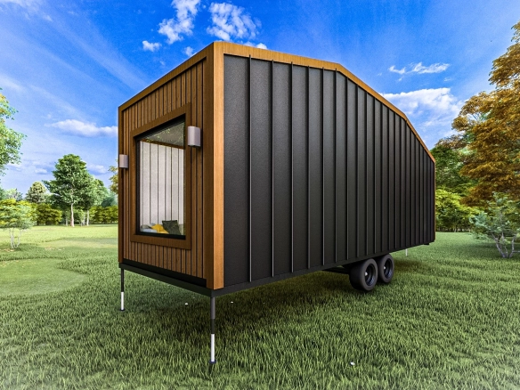 Çanakkale’de konumlanan 9 m 2+1 çift loftlu ruhsatlı taşınabilir Harmony Tiny House’un arka köşe görünümü.