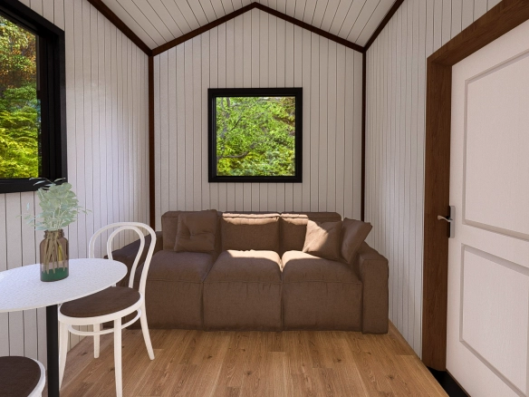 Natura L tiny house oturma odası, geniş pencereli ve doğa manzaralı yaşam alanı