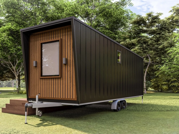 Kırklareli ve Edirne’de de kullanılabilen Pitch Black 7M tek katlı 1+1 ruhsatlı römorklu tiny house, siyah metal kaplama arka-yan cephe.