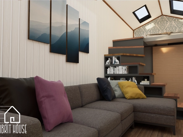 Oturma alanı ve loft kat merdivenlerinin bulunduğu küçük evin bir kesiti bulunuyor.
