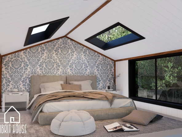 Tiny houseun loft katında bulunan bir yatak odası ve çatı pencereleri bulunuyor.